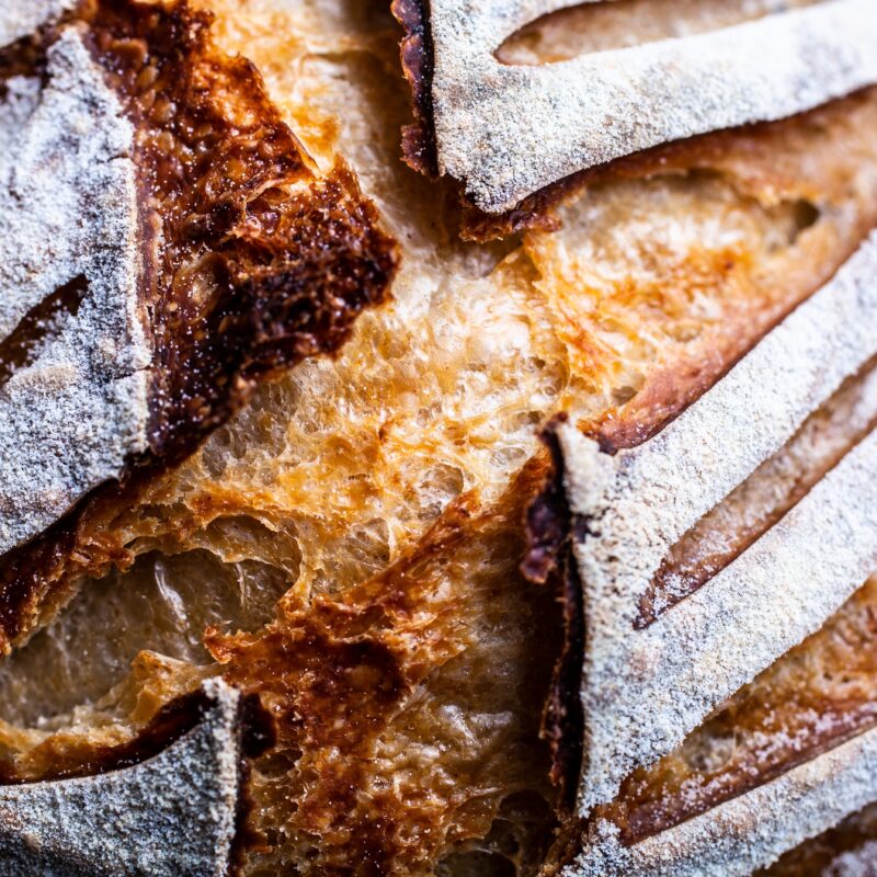 Close up of a scored sourdough bread