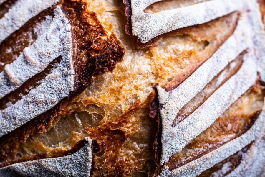 Close up of a scored sourdough bread